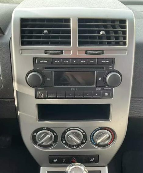 Autoradio origine Jeep Compass 2007 2011 première génération MK SUV compact crossover console centrale tableau de bord